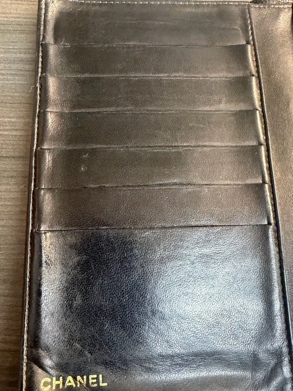 CHANEL Black Quilted Leather  Wallet   with Embossed Logo
